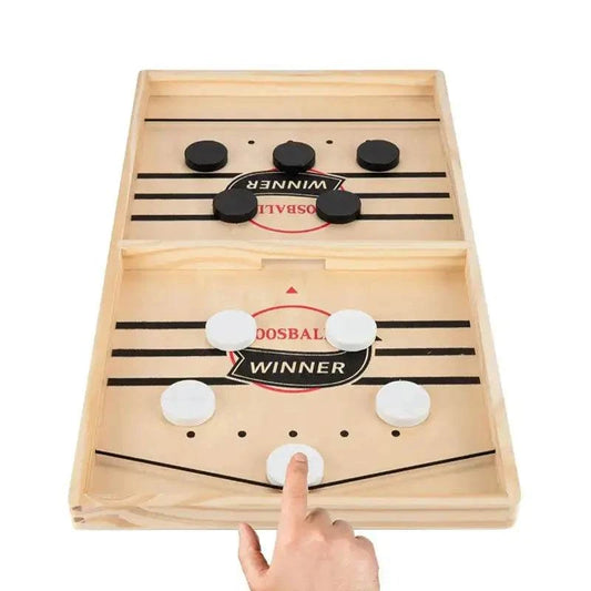 Fast Sling Puck Game wooden tabletop with black and white pucks and elastic band for quick family fun and competition