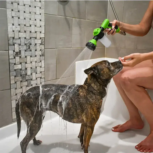 Adjustable pet wash sprayer with foam and rinse modes used for bathing a dog in bathtub