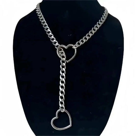 Silver Bold Heart Necklace with chain and heart-shaped pendants on black display